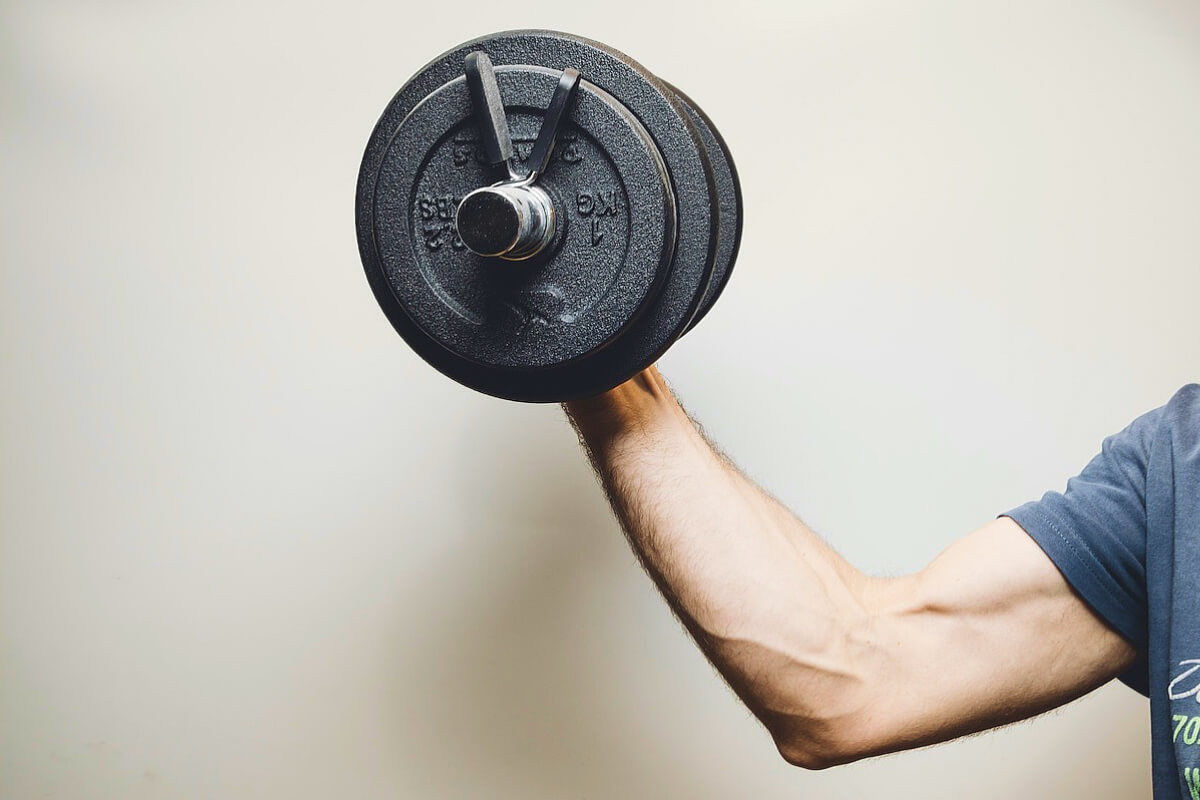 Man doing a bicep curl with weights