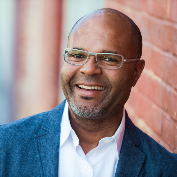 Headshot of Chris Murchison, RethinkCare expert and author