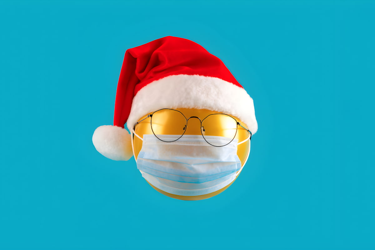 yellow balloon with glasses, Santa hat, and face mask