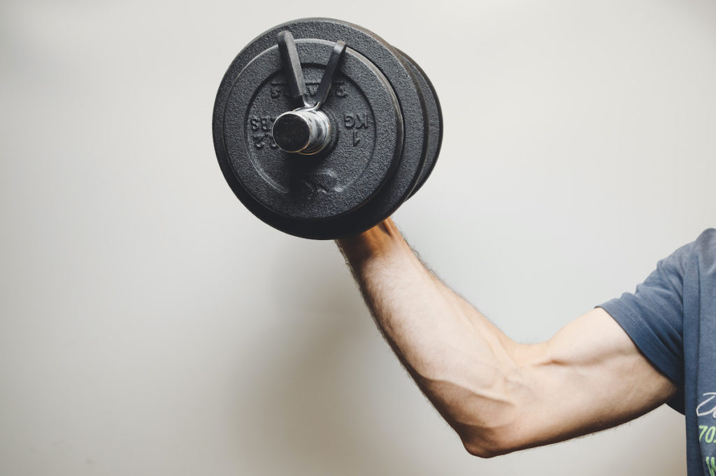 Man doing a bicep curl with weights