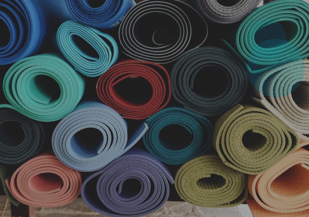 Yoga mats in a pile