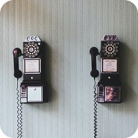 2 Retro payphones on a wall