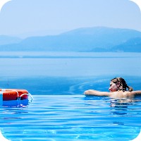 Woman in blue swimming pool