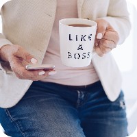 Woman holding like a boss mug