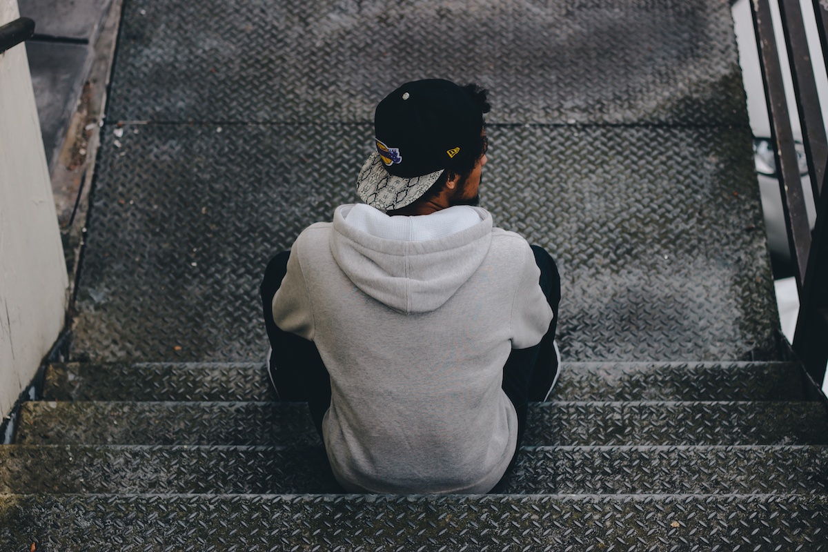 man sitting on stairs