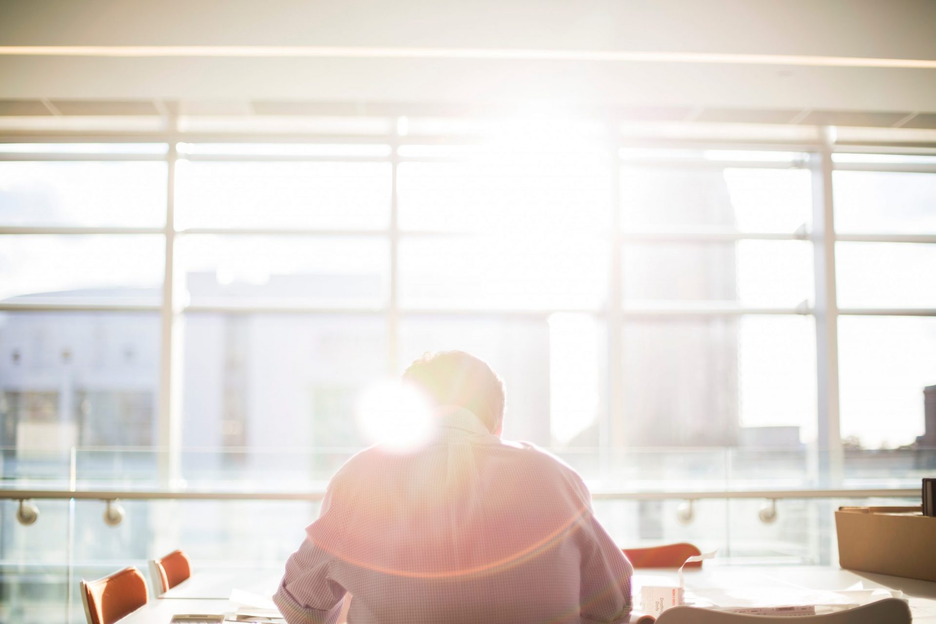 Man sitting at his desk and working