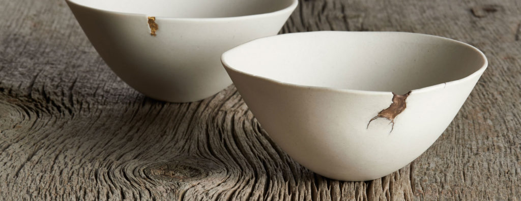 bowls with gold sealing the cracks in the bowl