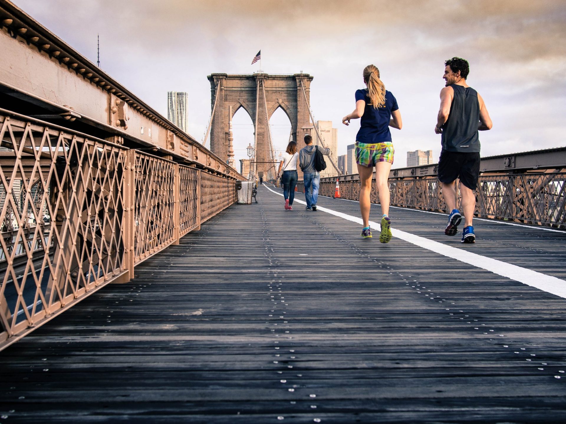 People running on Brooklyn bridge