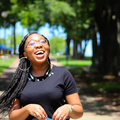 Woman laughing outside