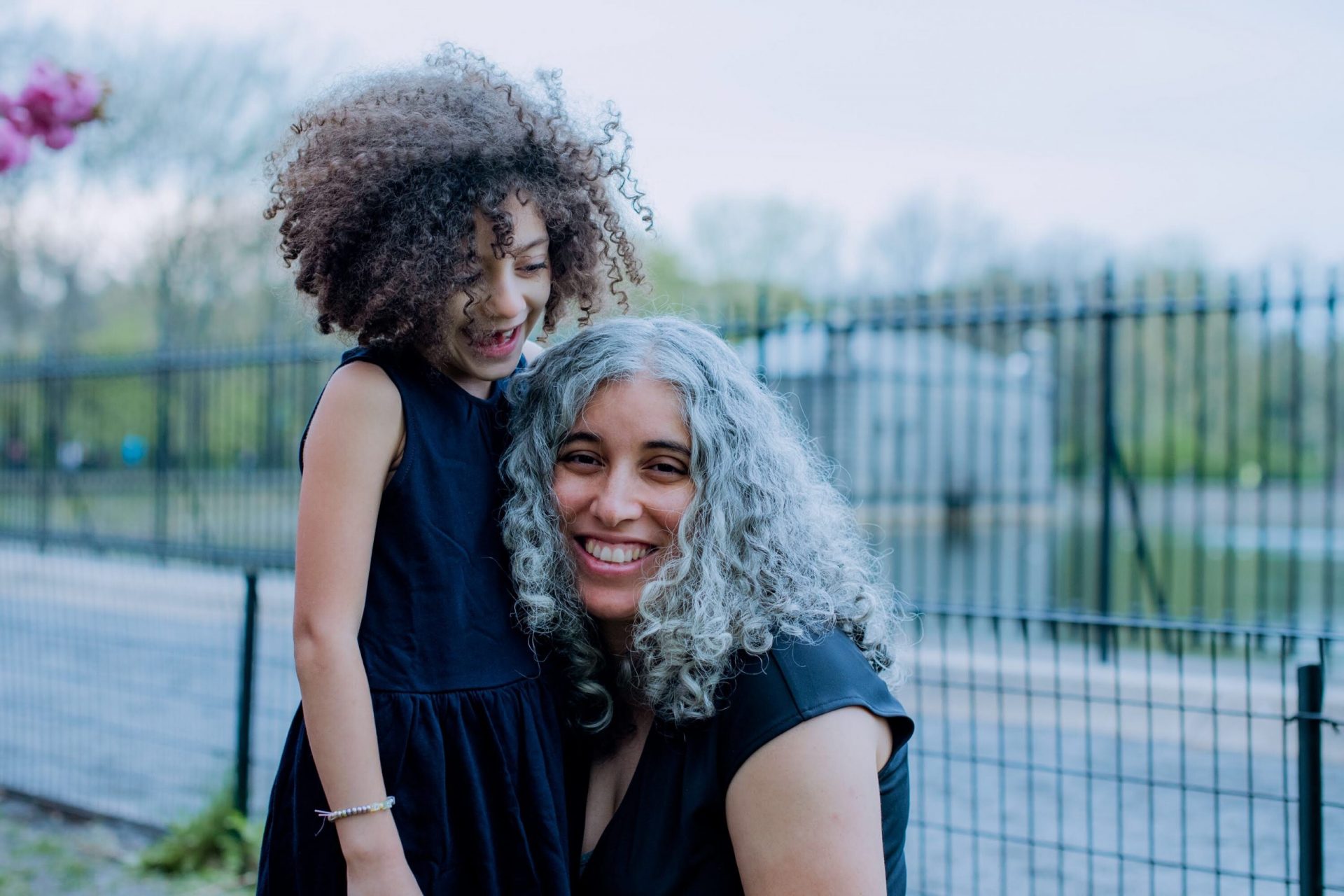 mother and daughter smiling