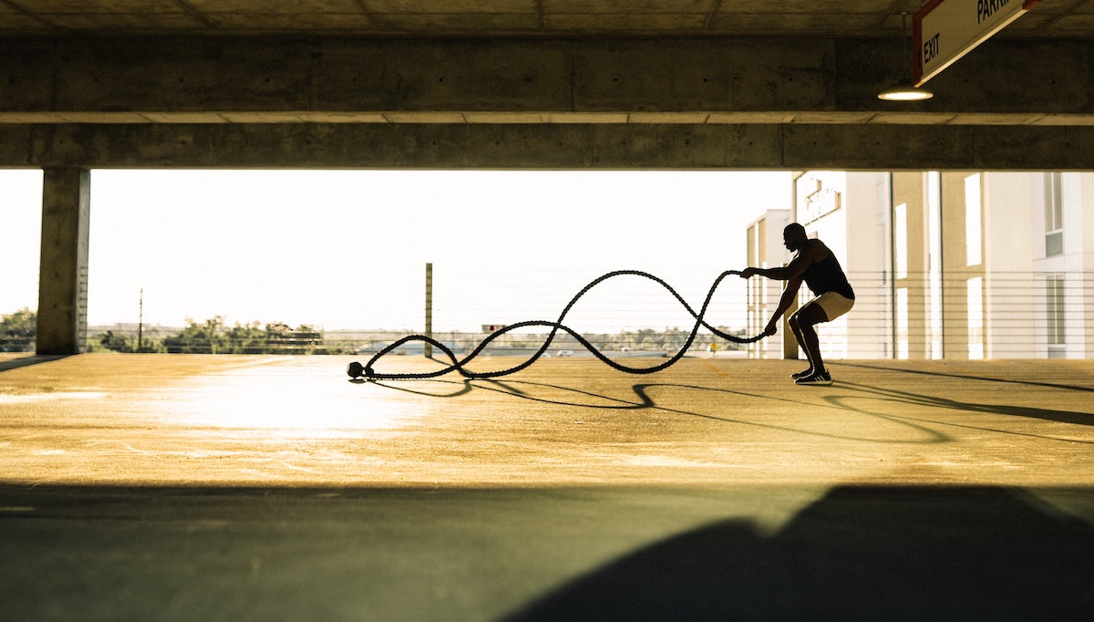 Man working out with ropes