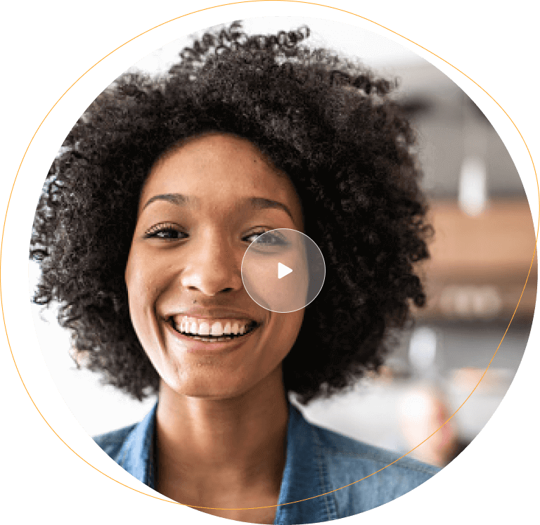 African American woman with curly hair smiling