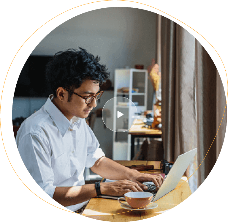 Man using laptop at his desk