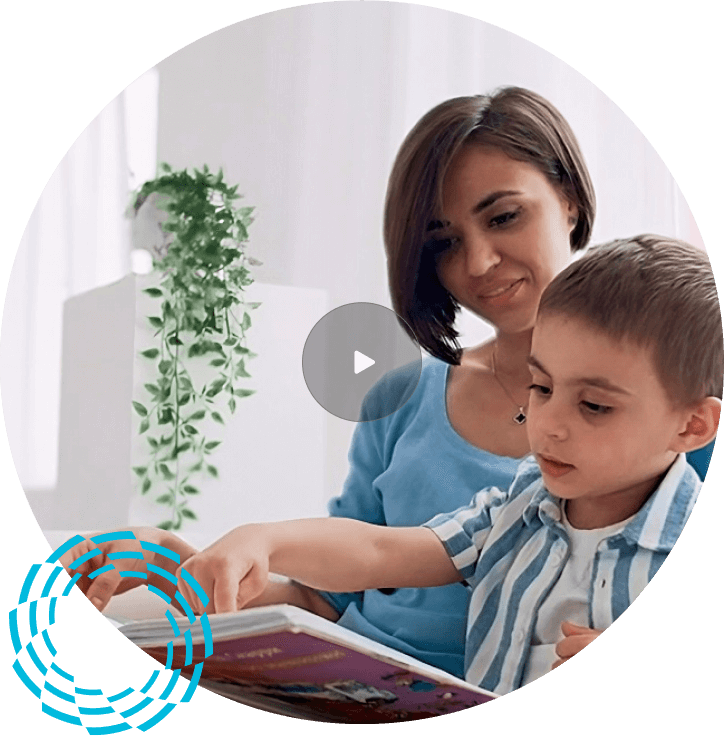 mother and son reading on couch